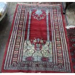 Two Pakistan Bokhara rugs, with red grounds, and a Pakistan Bokhara pattern rug (3).