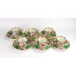A set of six English porcelain coffee cups and saucers, circa 1830,