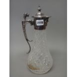 A silver mounted faceted glass claret jug, the angular handle with an animal head finial, modern,