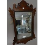 A George III mahogany fret cut pier glass, 37cm wide x 61cm high,