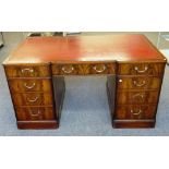 An 18th century style mahogany partner's pedestal desk,