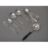 Silver, comprising; eight Victorian fiddle pattern dessert spoons, London 1860, two serving spoons,