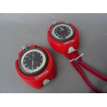 An Omega 9010A yacht timing stop watch, with plastic case and cord neck strap,