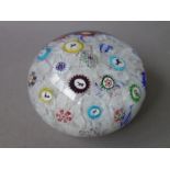 A Baccarat spaced millefiori paperweight, dated 1848,