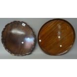 A George III dished mahogany circular serving tray with inlaid rim, 42cm diameter,