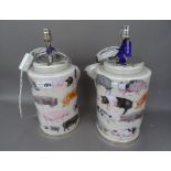 A pair of modern Decalcomania glass table lamps, decorated with pigs, 30cm high, (2).
