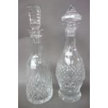 Two Waterford Crystal decanters and stoppers (33cm high),