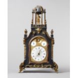 A George III ormolu-mounted ebonised quarter-striking automaton clock with moonphase,
