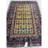 An Erivan rug, Caucasian, the saffron field with an allover stylised flower motif,