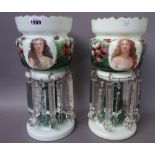 A matched pair of late 19th century green glass lustres, each transfer decorated with a female bust,