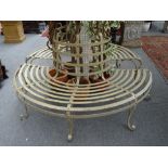 A Regency style cream painted wrought iron tree guard bench, circa 1900,