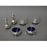 Six silver condiments, comprising; two mustard pots, two salts and two pepperettes,