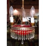 Lighting, including; a pair of mid-20th century three branch ceiling lights, with dome glass shades,