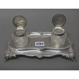 A silver shaped rectangular twin bottle inkstand, decorated with gadrooned rims,