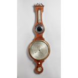 A Late Regency mahogany, tulipwood crossbanded and outlined wheel barometer By William Horrod,