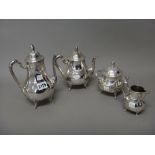 A French four piece tea and coffee set, comprising; a teapot, a coffee pot,
