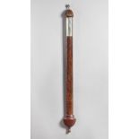 A bow-fronted mahogany stick barometer In the style of Adie, Edinburgh,