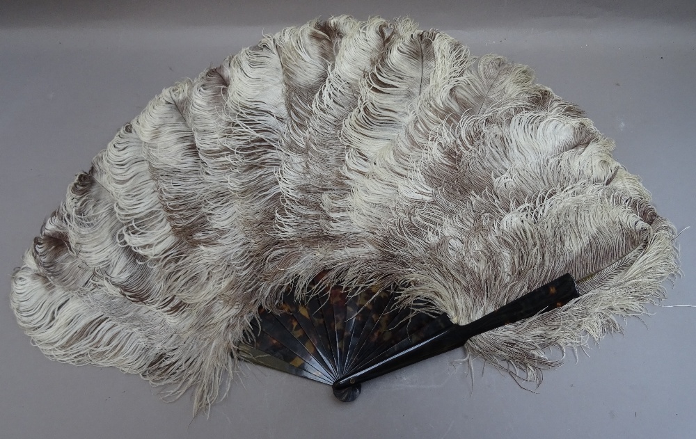 An Edwardian ostrich feather and tortoiseshell fan, with white metal monogram to the guard stick, - Image 3 of 5