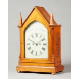 A Victorian gothic oak mantel clock By Stedman, Godalming,