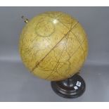 A reproduction table globe labelled 'Globo Terrestre In Roma' on a loaded wooden circular base (a.