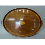 A George III conch shell inlaid tulipwood banded mahogany galleried oval serving tray,