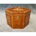 A George III boxwood strung marquetry inlaid harewood tea caddy, of compressed octagonal form,