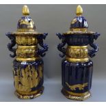 A pair of tall Mason's Ironstone mazarine blue-ground two-handled vases and covers, circa 1820,