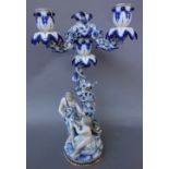 A Meissen porcelain blue and white, figural three branch candelabra, late 19th century,