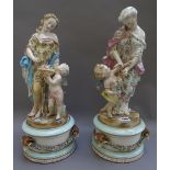 A large pair of German porcelain figure groups with matching bases, late 19th century,