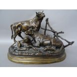 After Jules Moigniez; a French bronze cattle group on a naturalistic shaped base,