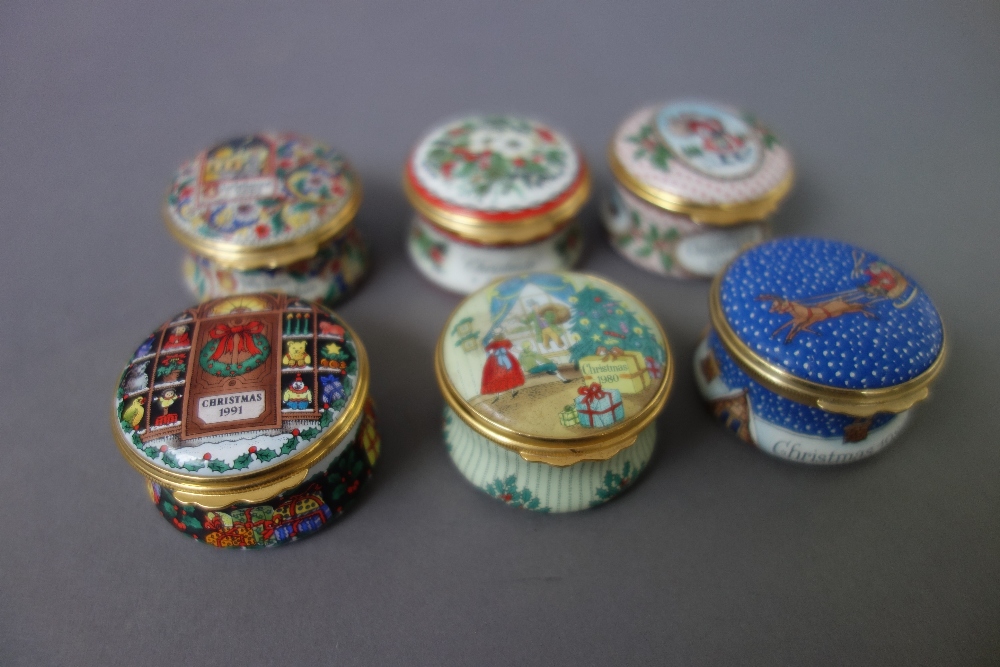 Twenty Halcyon Days enamel 'Christmas boxes' comprising years; 1977, 1980, 1981, 1985,