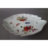 A small Chelsea leaf shaped dish, circa 1758-60, painted with fruit, flowers and insects,