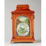 A George III mahogany triple-train musical automata table clock with pull-repeat By Thomas Hunter,