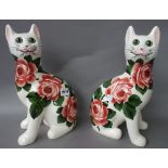 A pair of Griselda Hill pottery `Wemyss ware' cats, late 20th century, decorated with roses,