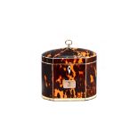 A Regency ivory banded tortoiseshell tea caddy of compressed oval form, with single lidded interior,