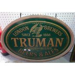 A group of three 20th century wooden beer/ale advertising signs,