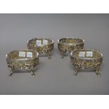 Two pairs of silver gilt salts, each of oval form,