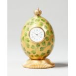 A Modern giltmetal and enamel Clover Egg timepiece By Theo Faberge, England, No.