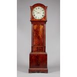 A late Regency mahogany longcase clock The dial inscribed Robt.