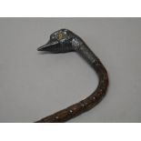 A Victorian novelty silver mounted walking stick, the handle formed as a bird's head,