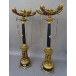 A pair of Empire style gilt metal five branch candelabra, 20th century,