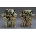A pair of Sitzendorf porcelain figural jardinières, early 20th century,