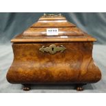 A 19th century and later figured walnut square tea caddy, of bloated bombé form,