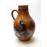 A large German brown salt glaze stoneware baluster jug, 20th century, in earlier style,