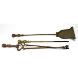 A set of three Victorian brass fire tools, with baluster and spherical capitals,