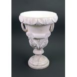 A carved and turned alabaster vase, after the antique, 20th century, with ring side handles,