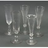 Five facet cut champagne flutes, 19th/20th century including a pair (5).