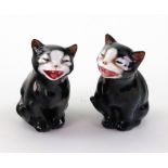 A pair of Royal Doulton 'Lucky' cats, 7cm high.