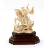 A carved ivory figure of St. George slaying the dragon, early 20th century, 9.