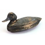 A carved and painted wooden decoy duck, late 19th/early 20th century, 36cm long.